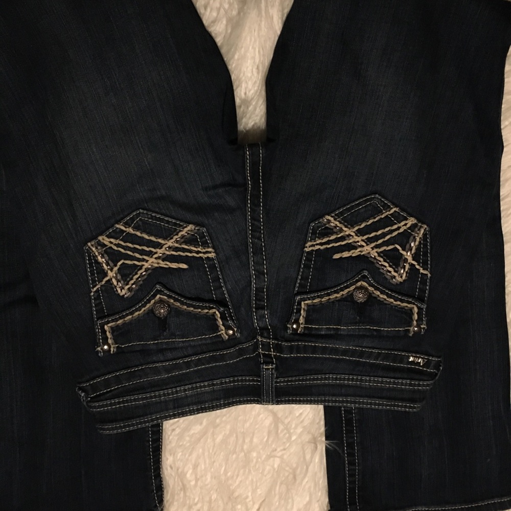 Like new Ariat  Turquoise Jeans sz 29R